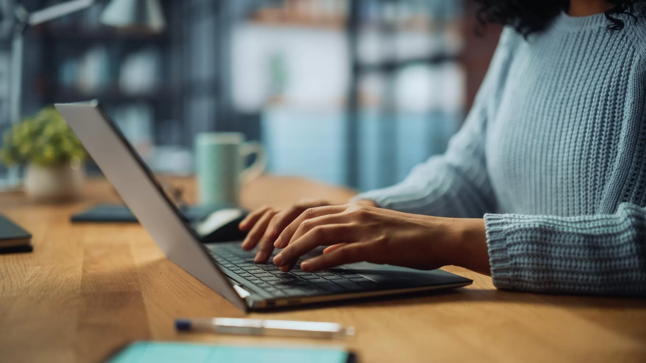 A person using a laptop.